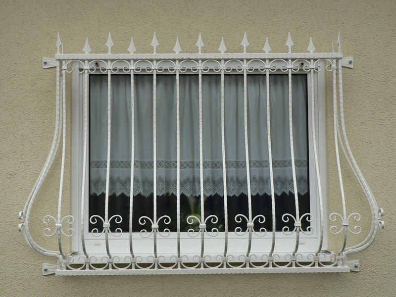 Кованая решетка на окна Фото 083
